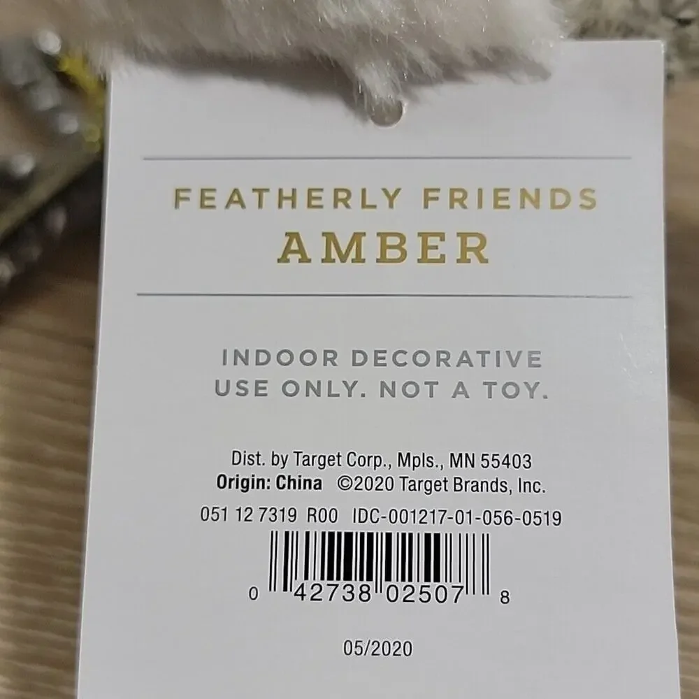 Wonder shop Target 2020 - Amber‎ our feathery friend wearing muffs & scarf